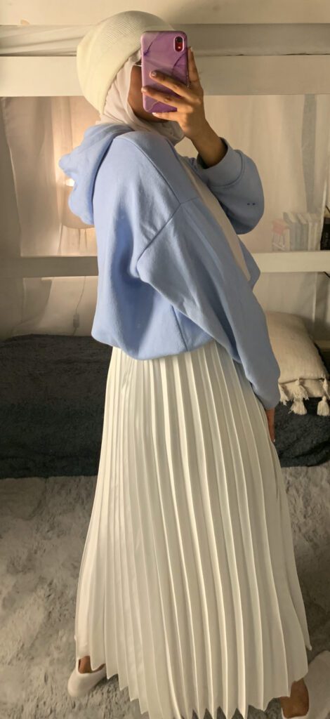 blue hoodie and white pleated skirt